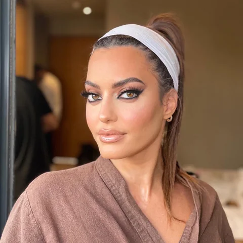 Backstage beauty moment — sculpted celebrity glam before the final look, makeup by Aya Abdelhamid