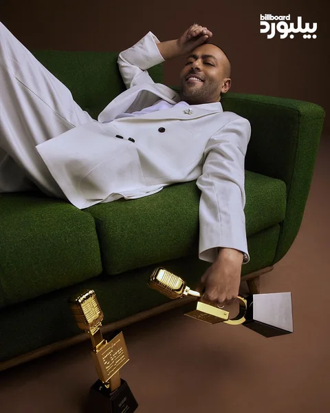 Recording artist award-shoot editorial — relaxed tailoring, precise male grooming by Aya Abdelhamid